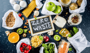 Zero waste concept with reusable bags, jars, and fresh produce.